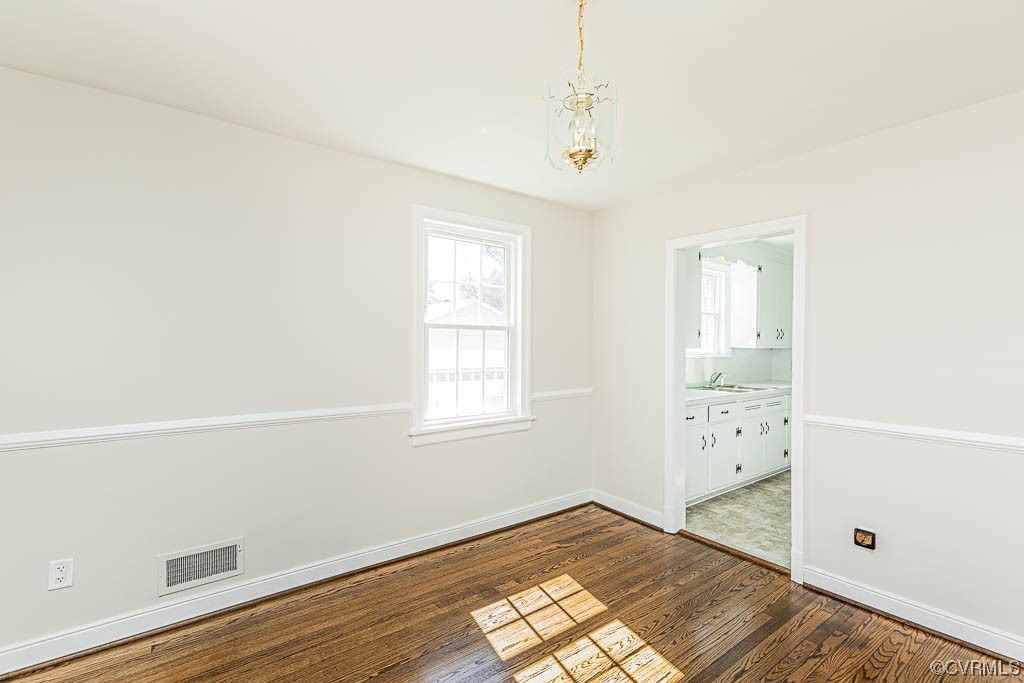 2317 New Berne Road Henrico, VA 23228 - Photo 17 of 37 a view of a room with wooden floor and windows
