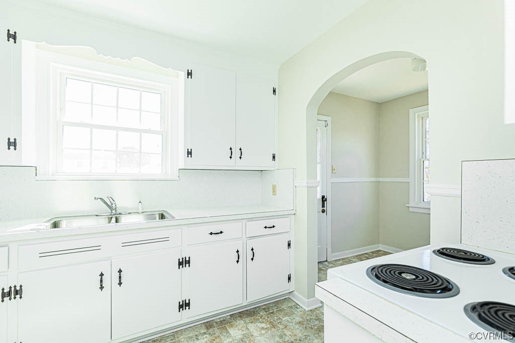 2317 New Berne Road Henrico, VA 23228 - Photo 21 of 37 a kitchen with sink cabinets and stove