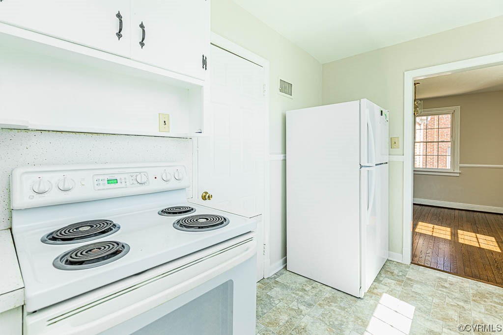 2317 New Berne Road Henrico, VA 23228 - Photo 24 of 37 a white refrigerator freezer sitting inside of a kitchen
