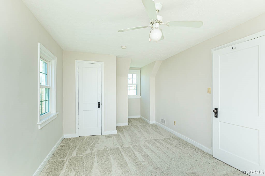 2317 New Berne Road Henrico, VA 23228 - Photo 29 of 37 a view of an empty room with window and chandelier fan