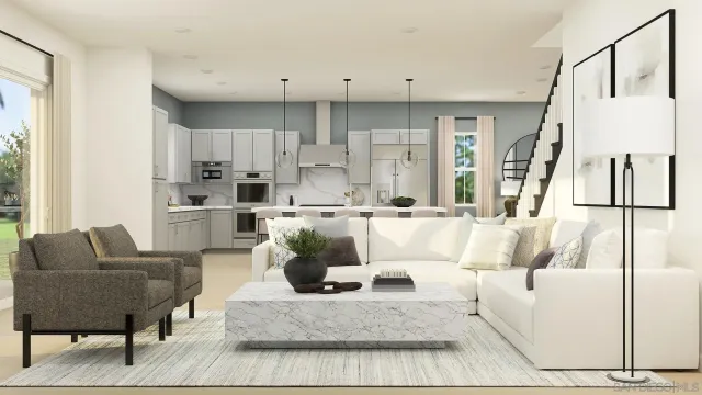 a living room with stainless steel appliances kitchen island granite countertop furniture and a rug