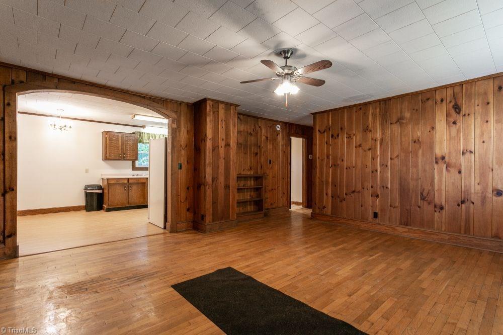 123 Hudson Street Elkin, NC 28621 - Photo 11 of 25 Living room looking toward kitchen and toward hallway leading to bath and 3 bedrooms.