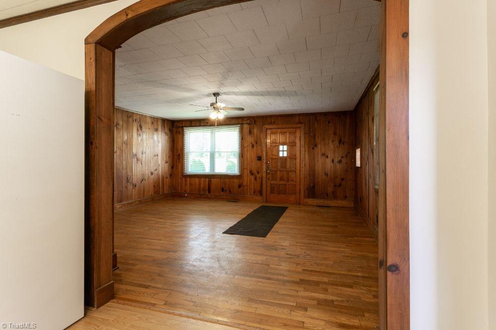 123 Hudson Street Elkin, NC 28621 - Photo 13 of 25 View from kitchen looking toward den and front door.