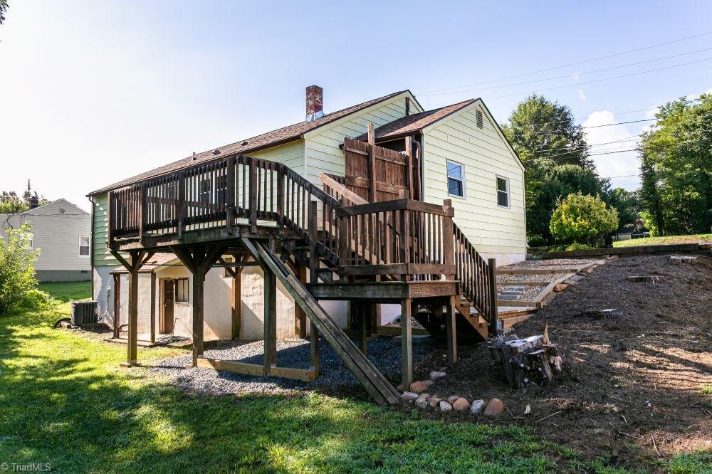 123 Hudson Street Elkin, NC 28621 - Photo 5 of 25 Rear view of home. Deck with steps leading to side yard.