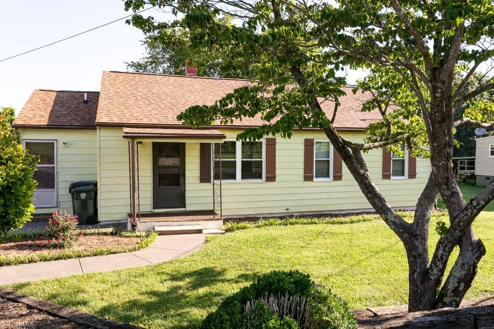 123 Hudson Street Elkin, NC 28621 - Photo 9 of 25 This home features aluminum siding, new roof and new windows.