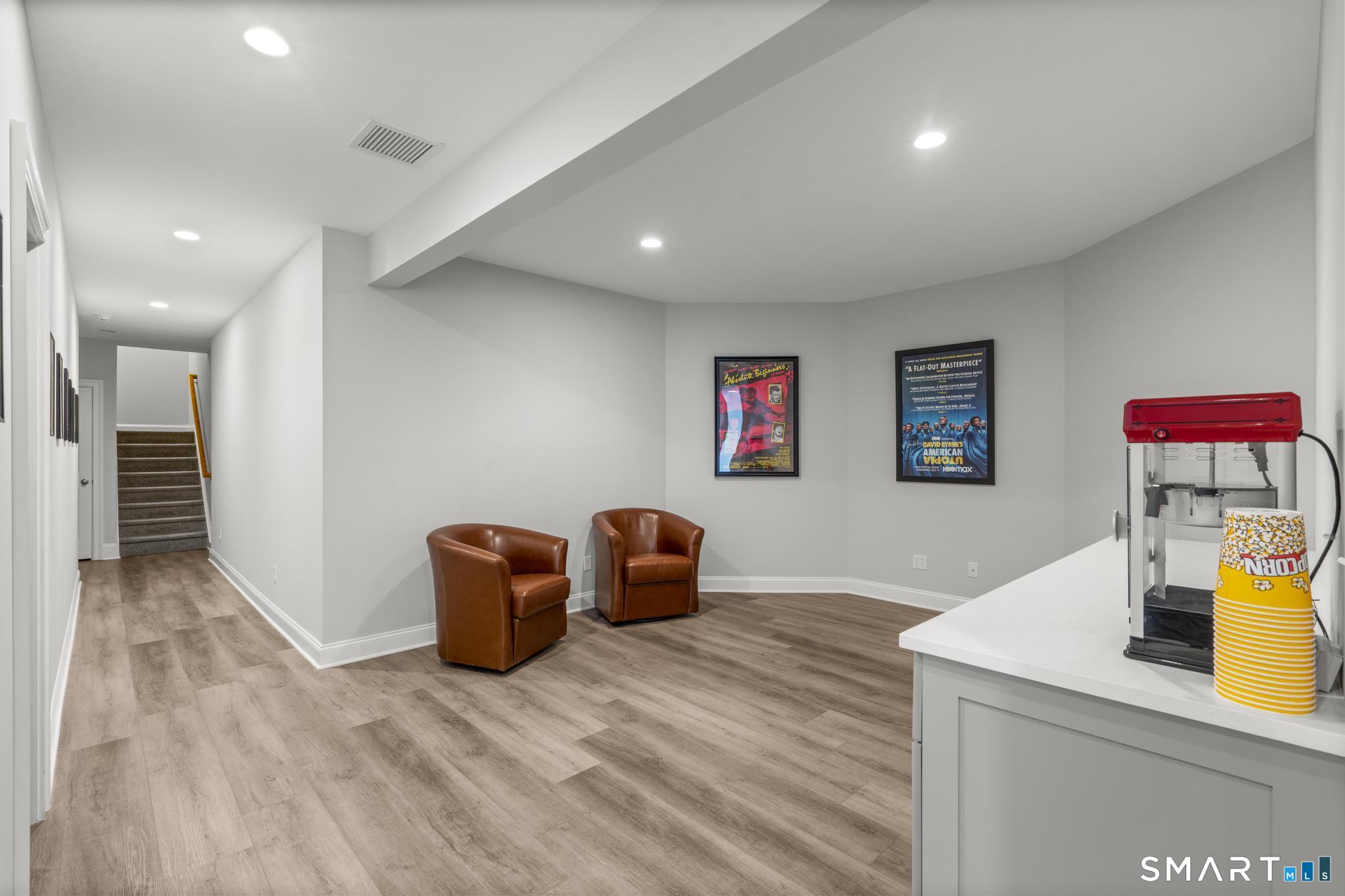 32 Blanket Meadow Road Monroe, CT 06468 - Photo 30 of 40 Lower Level Sitting area with beverage center