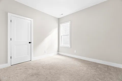 a black and white photo of a living room