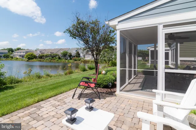a view of a backyard with garden and plants