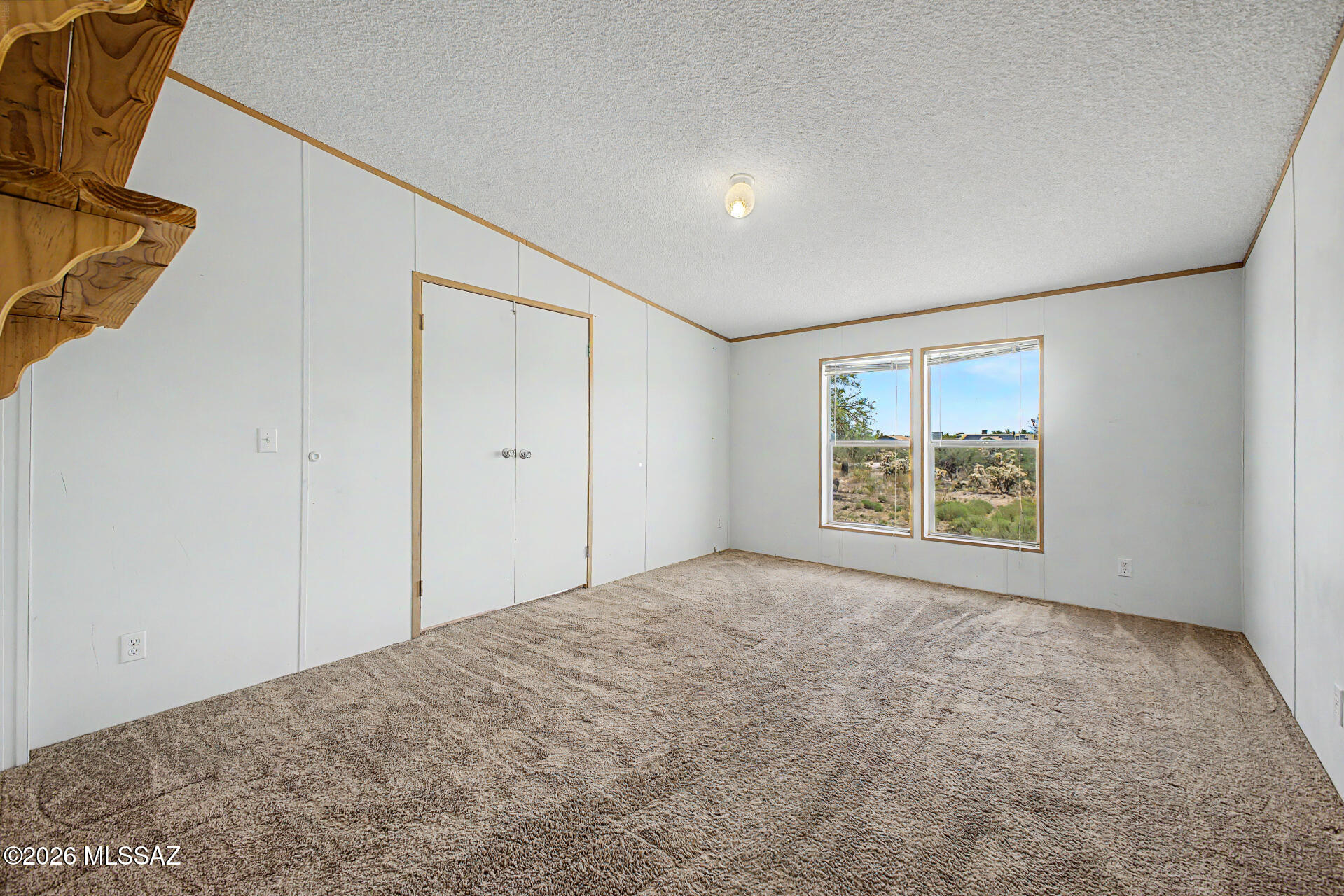 1911 West Thunder Road Vail, AZ 85641 - Photo 22 of 38 a view of an empty room with a window