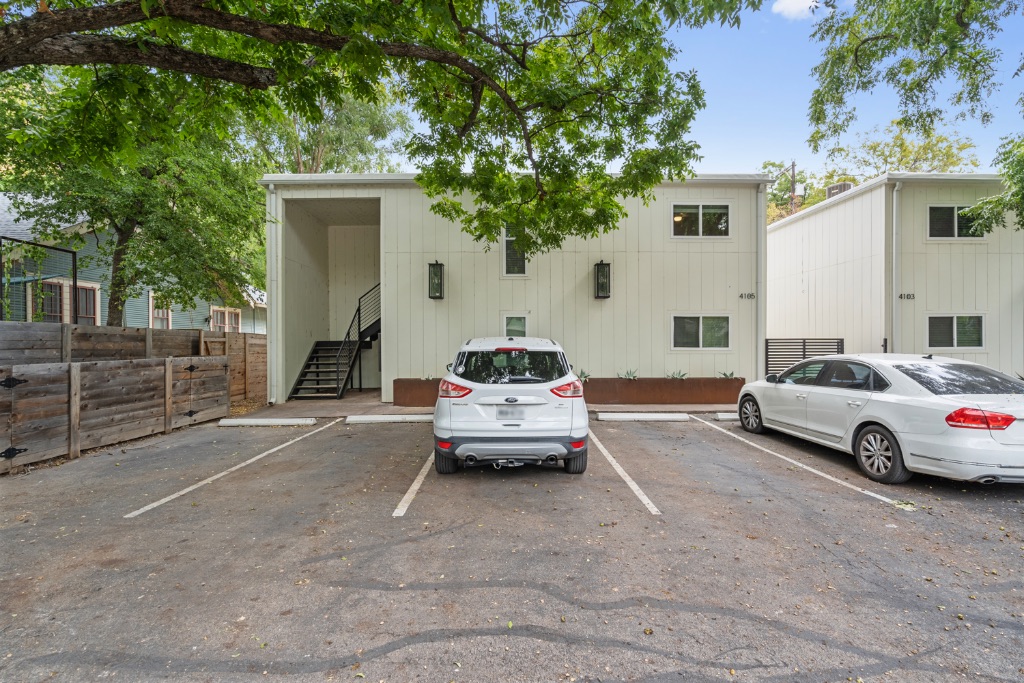 4105 Speedway, Unit 105 Austin, TX 78751 - Photo 13 of 14 a car parked in front of white house