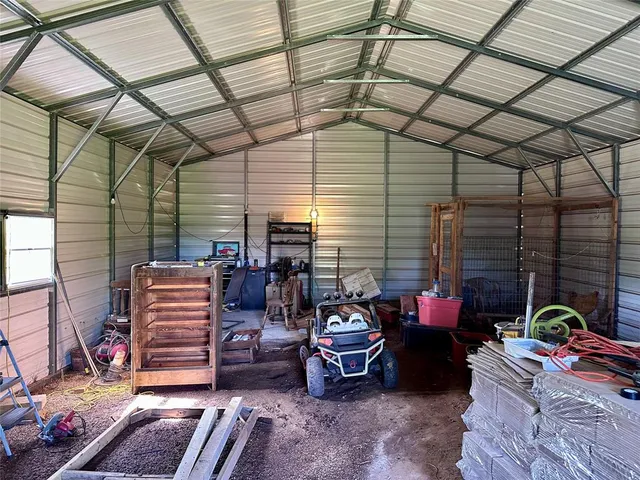 a backyard of a house with seating space