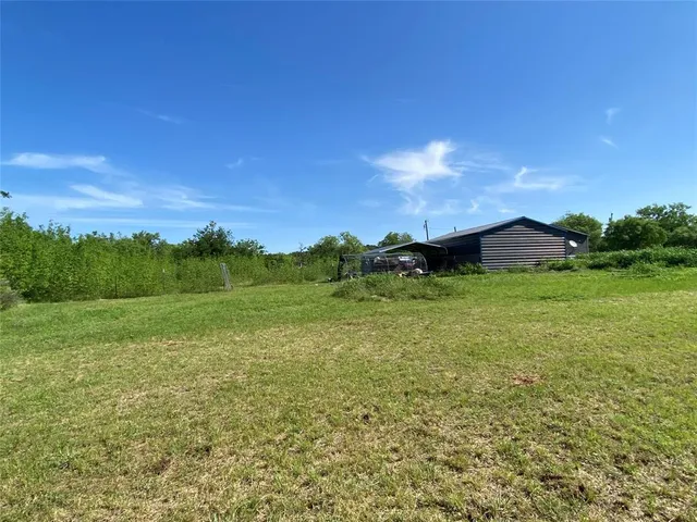 a view of an outdoor space and a yard