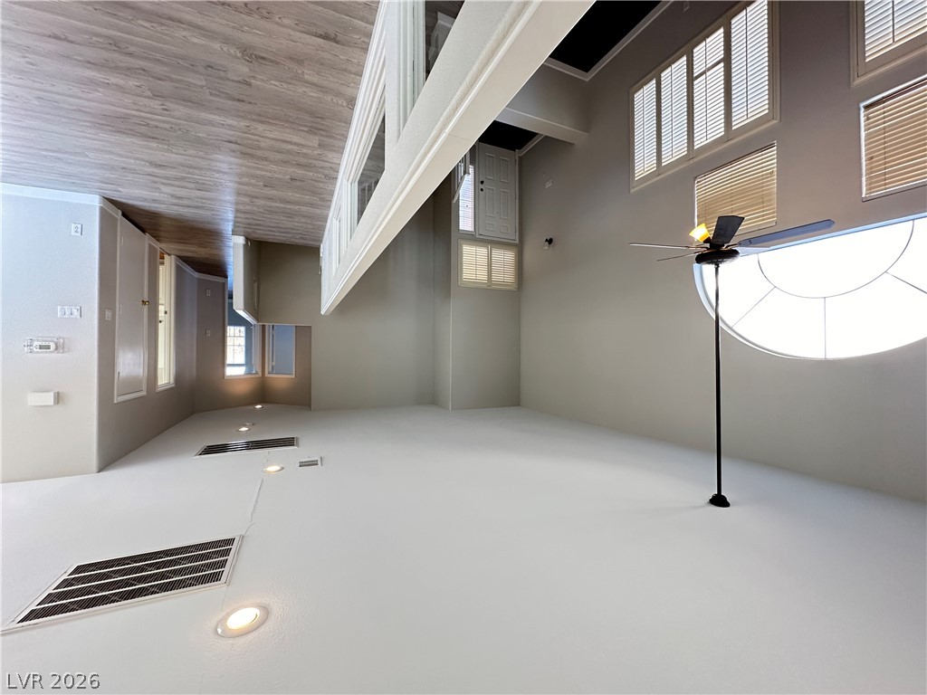 10191 Splendor Ridge Avenue Las Vegas, NV 89135 - Photo 15 of 31 An airy great room features high ceilings and an abundance of natural light.
