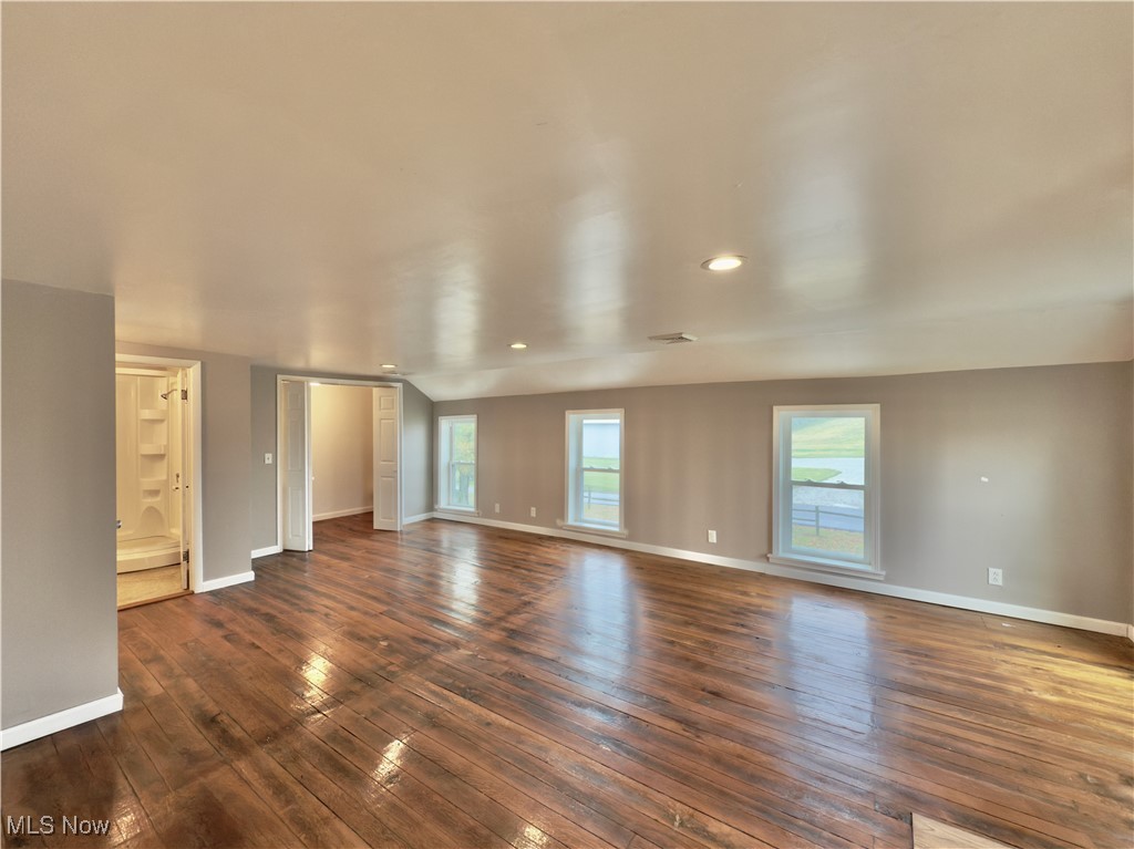 2109 Bell Road Vincent, OH 45784 - Photo 39 of 49 Empty room with plenty of natural light, dark wood-style floors, and recessed lighting