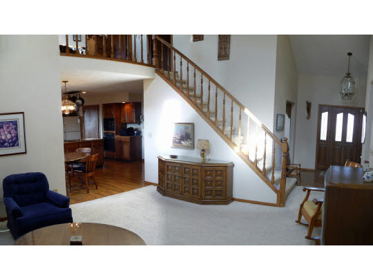9605 Rambouillet Ridge Roscoe, IL 61073 - Photo 3 of 11 a living room with furniture and a wooden floor