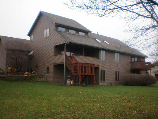 9605 Rambouillet Ridge Roscoe, IL 61073 - Photo 10 of 11 front view of a house with a yard