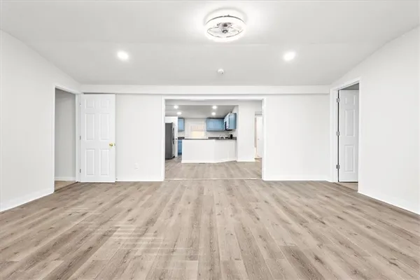 a view of kitchen with wooden floor