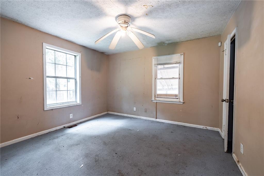 3838 Old Gordon Road Northwest Atlanta, GA 30336 - Photo 19 of 23 a view of an empty room with a window