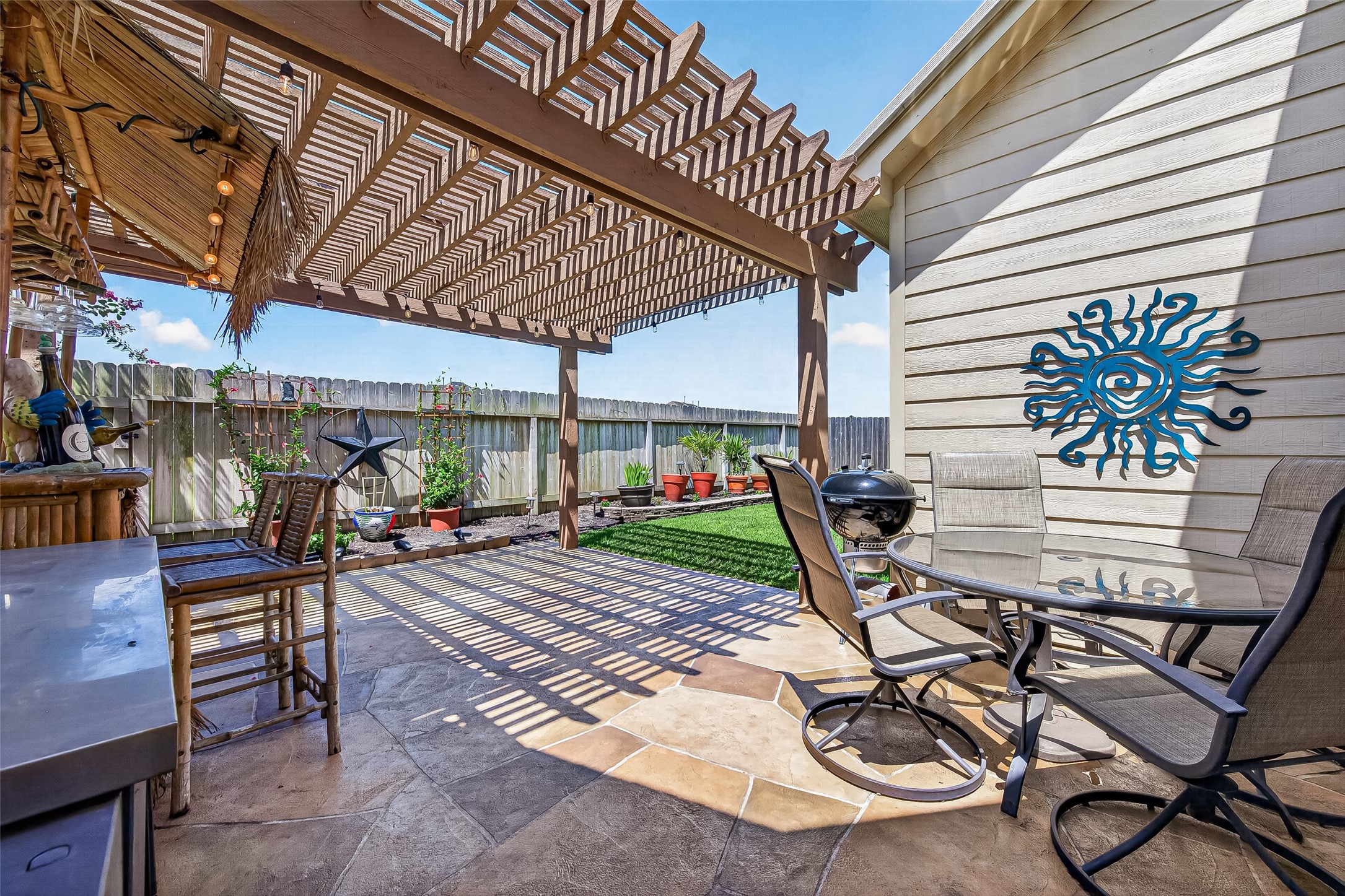 4910 Culver Lane Rosenberg, TX 77471 - Photo 46 of 50 Ideal backyard for outdoor cooking and relaxing atmosphere.