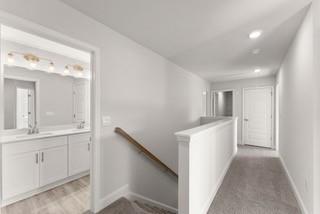 636 Bald Ridge Circle Demorest, GA 30535 - Photo 17 of 35 a view of hallway with cabinets and wooden floor