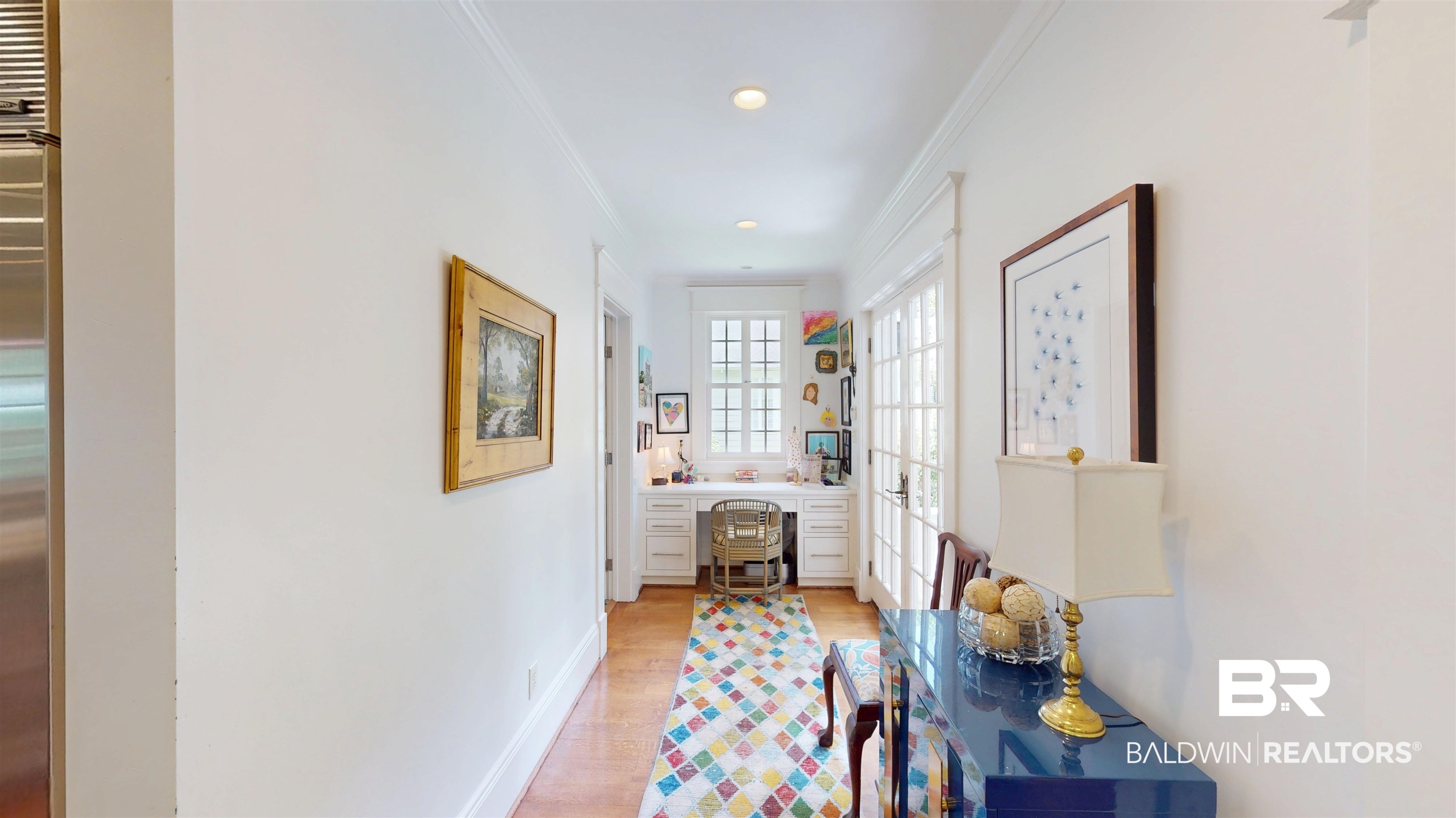 211 Lanier Avenue Mobile, AL 36607 - Photo 29 of 73 Hallway with an office area, light wood-style floors, and crown molding