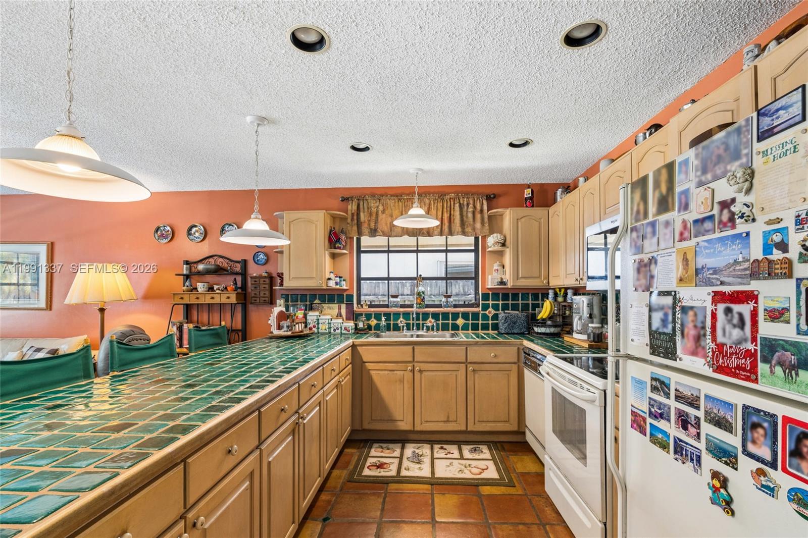 11403 Southwest 129th Place Miami, FL 33186 - Photo 11 of 38 a kitchen with lots of counter top space