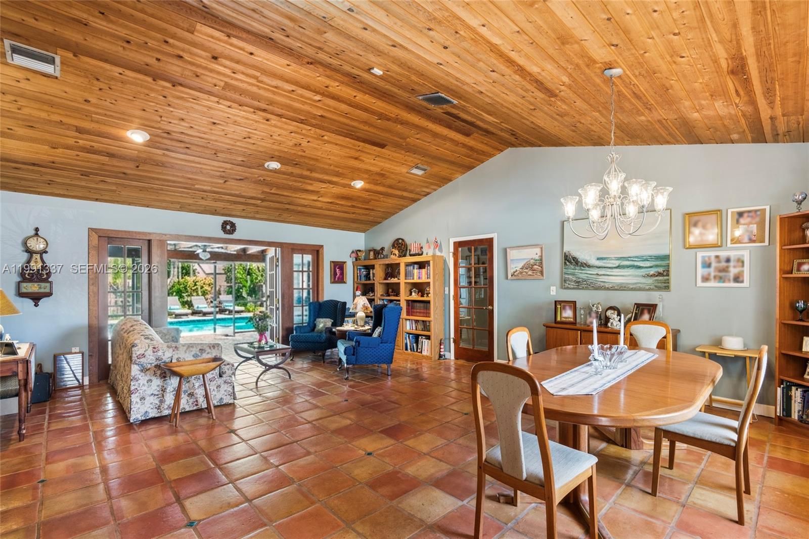 11403 Southwest 129th Place Miami, FL 33186 - Photo 15 of 38 a view of a dining room with furniture window and outside view