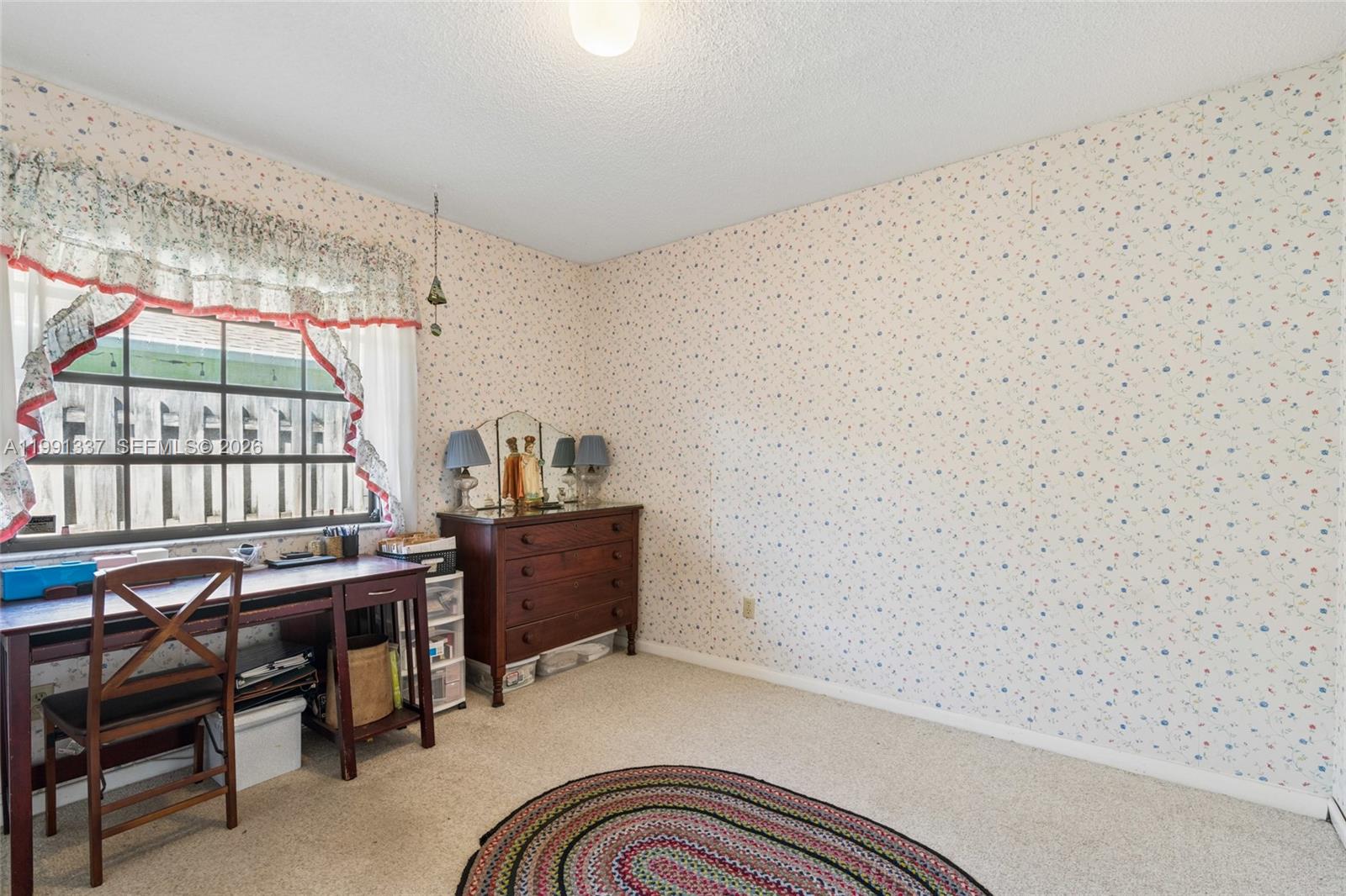 11403 Southwest 129th Place Miami, FL 33186 - Photo 24 of 38 a view of workspace with furniture and window