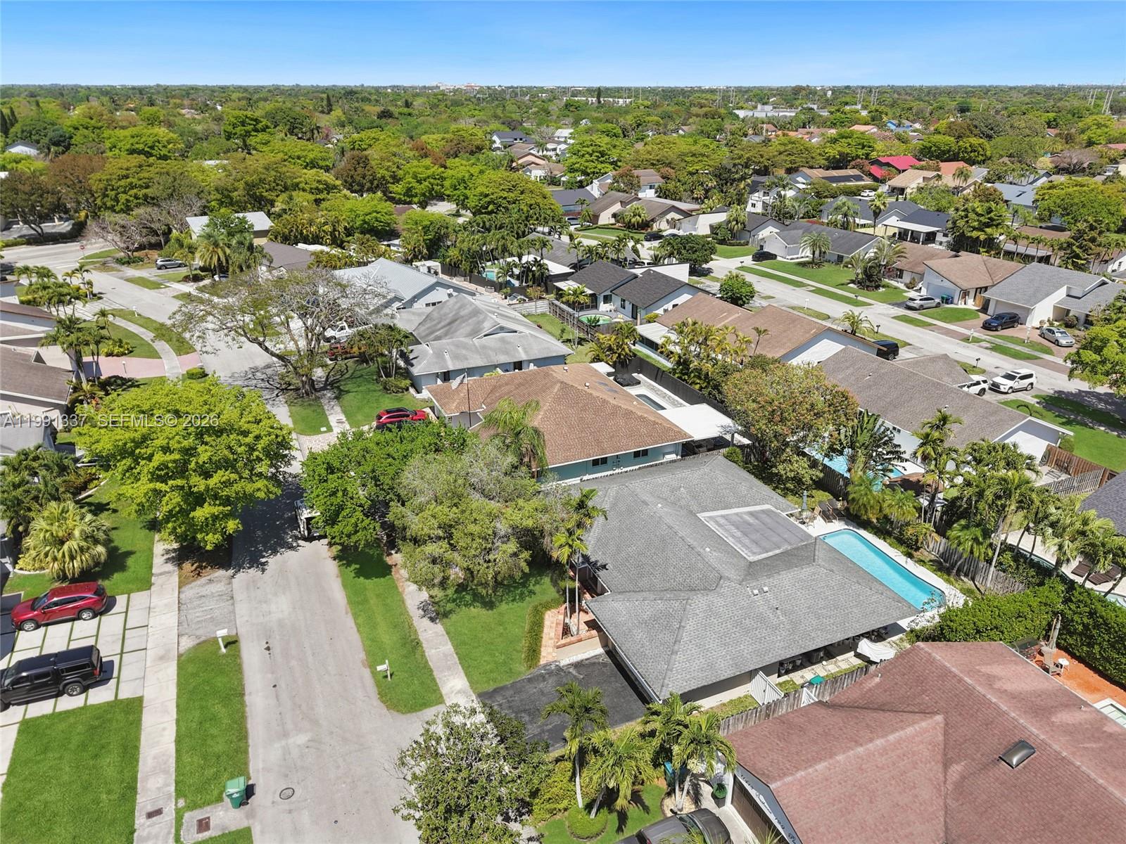 11403 Southwest 129th Place Miami, FL 33186 - Photo 34 of 38 an aerial view of residential houses with outdoor space
