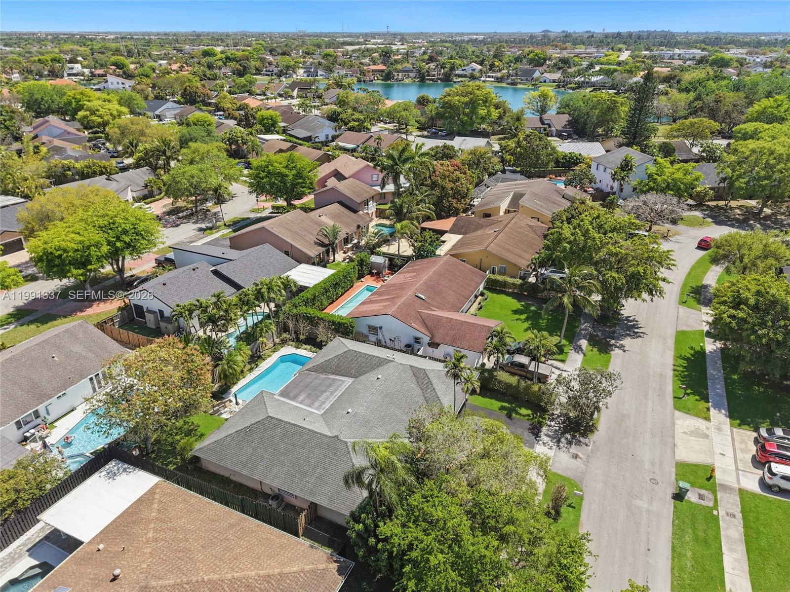 11403 Southwest 129th Place Miami, FL 33186 - Photo 36 of 38 an aerial view of residential houses with outdoor space