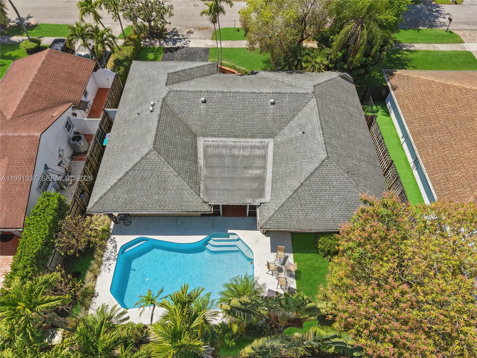 11403 Southwest 129th Place Miami, FL 33186 - Photo 37 of 38 an aerial view of a house with a garden