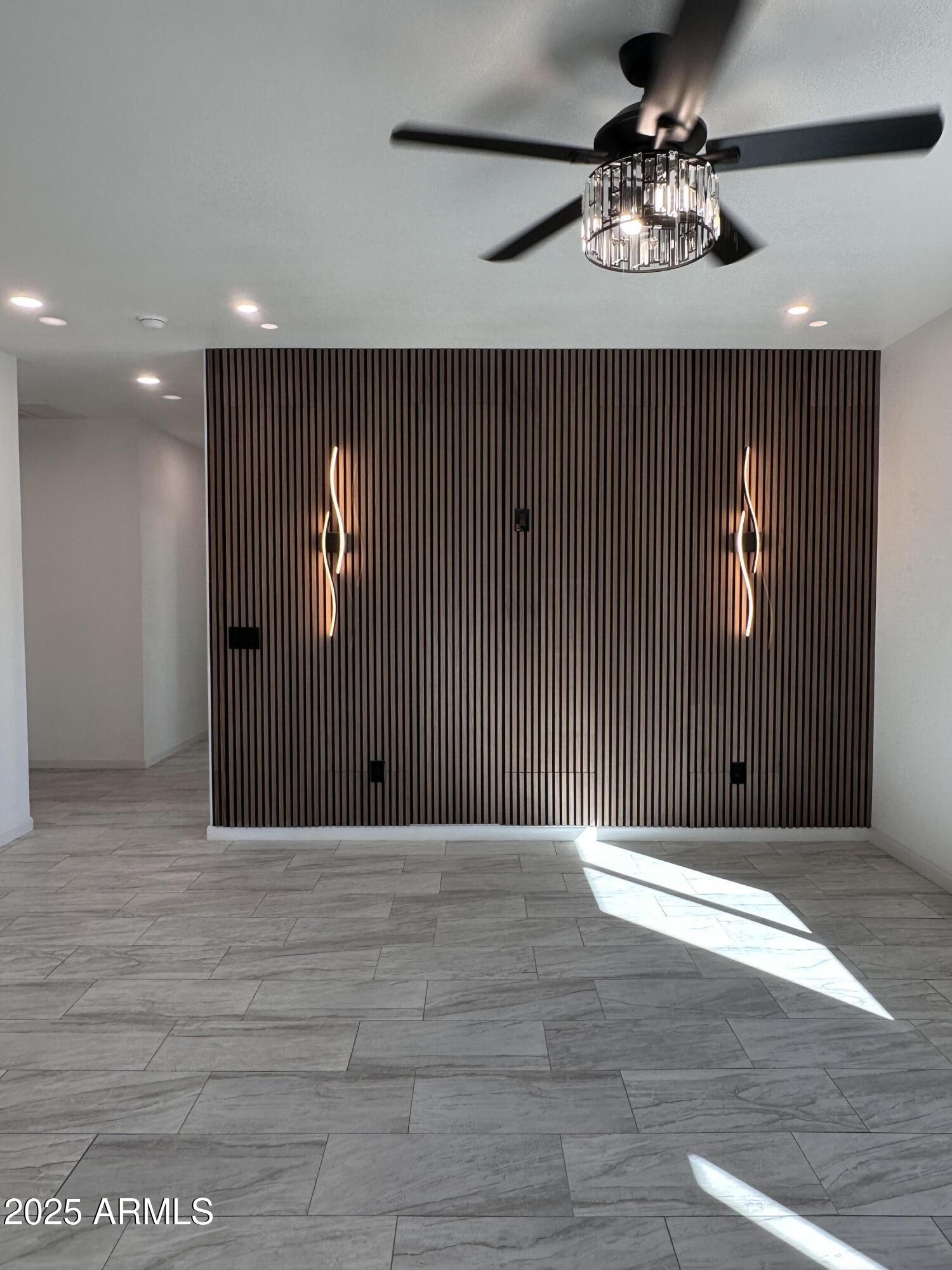 722 East 3rd Street Douglas, AZ 85607 - Photo 5 of 24 a view of an empty room with wooden floor