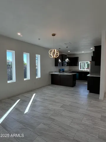 a lobby with furniture and windows