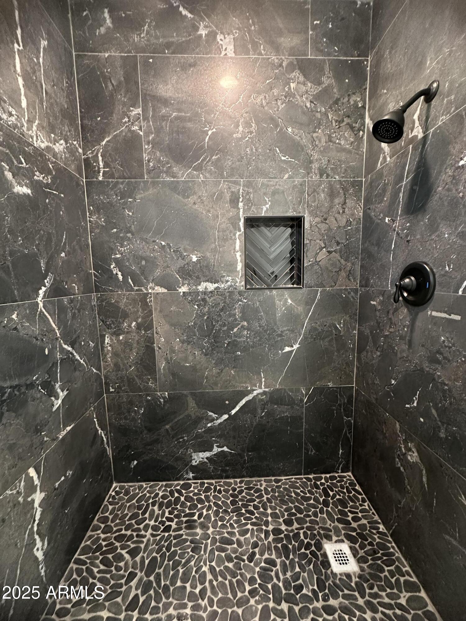 722 East 3rd Street Douglas, AZ 85607 - Photo 10 of 24 a bathroom with a shower
