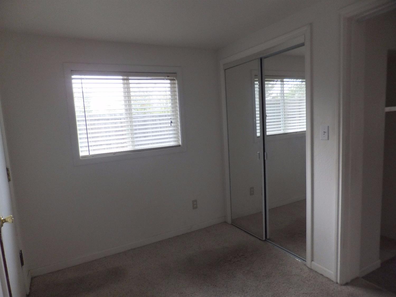 1312 Talent Avenue Talent, OR 97540 - Photo 18 of 21 an empty room with windows