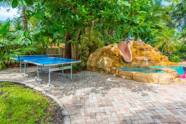 a view of a chairs in a backyard