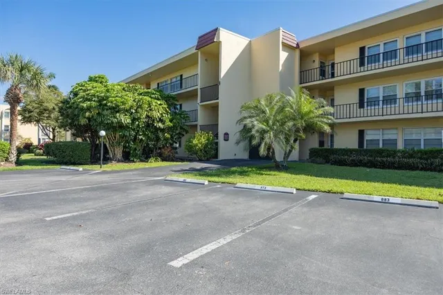 a view of building with yard