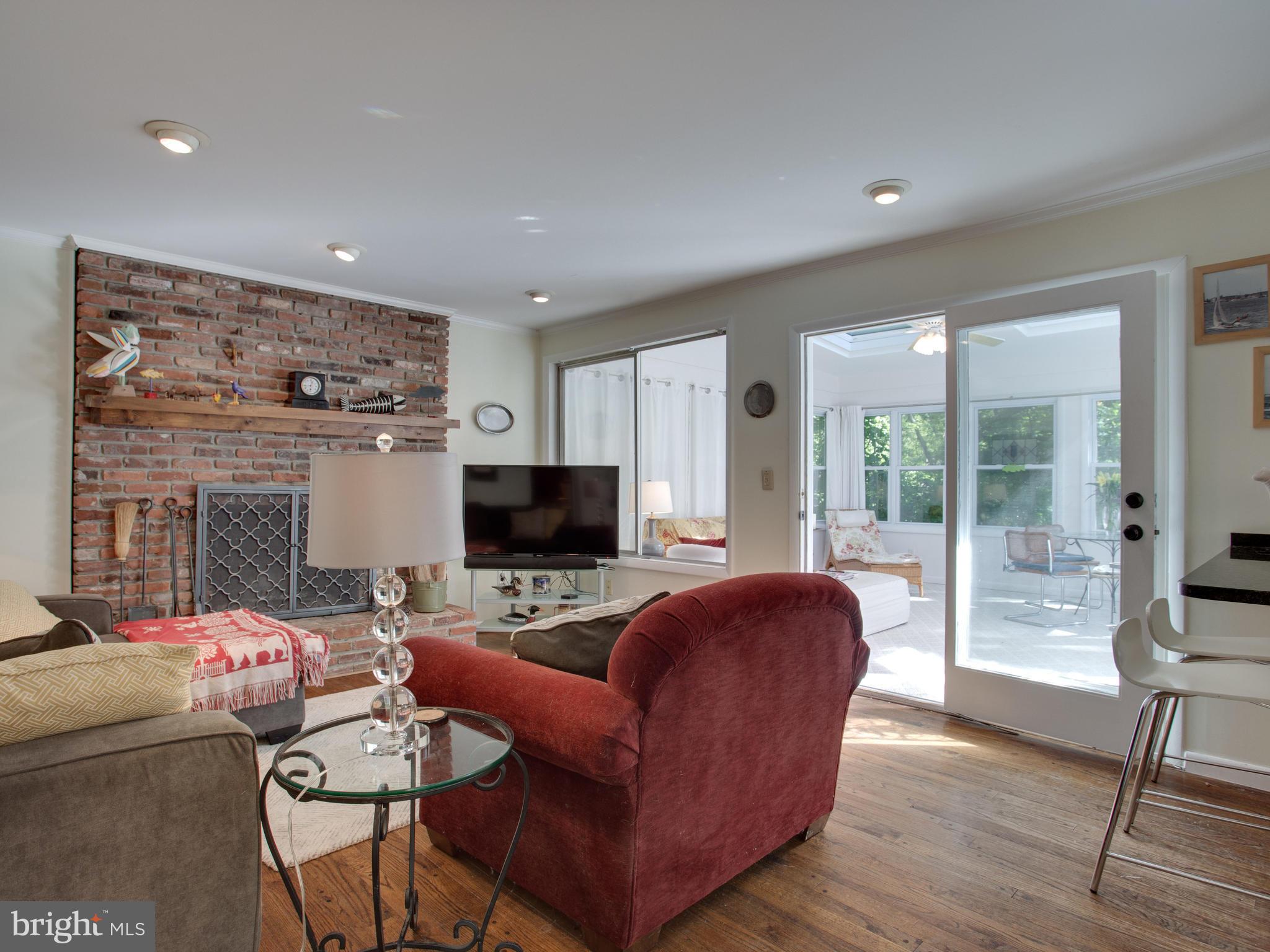 1026 Old Bay Ridge Road Annapolis, MD 21403 - Photo 10 of 30 Den with fireplace