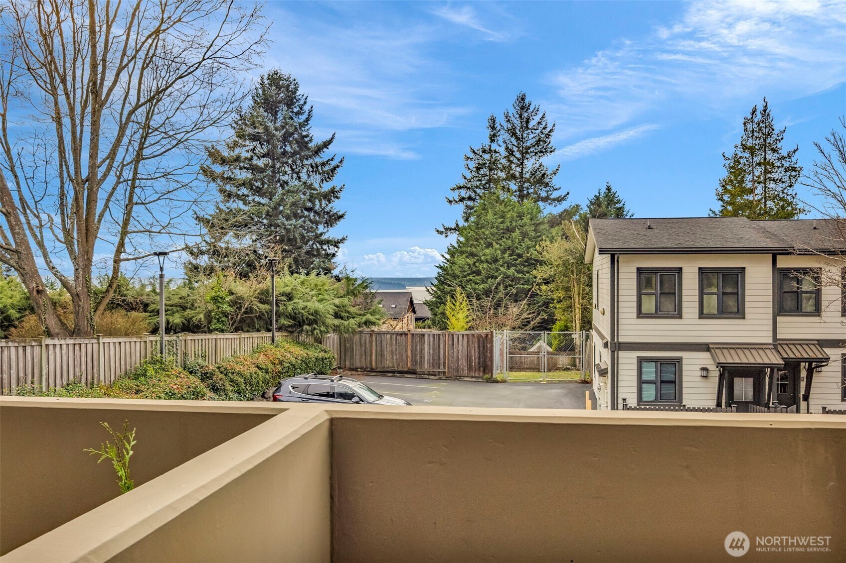 5001 California Avenue Southwest, Unit 103 Seattle, WA 98136 - Photo 16 of 40 a view of a house with a backyard
