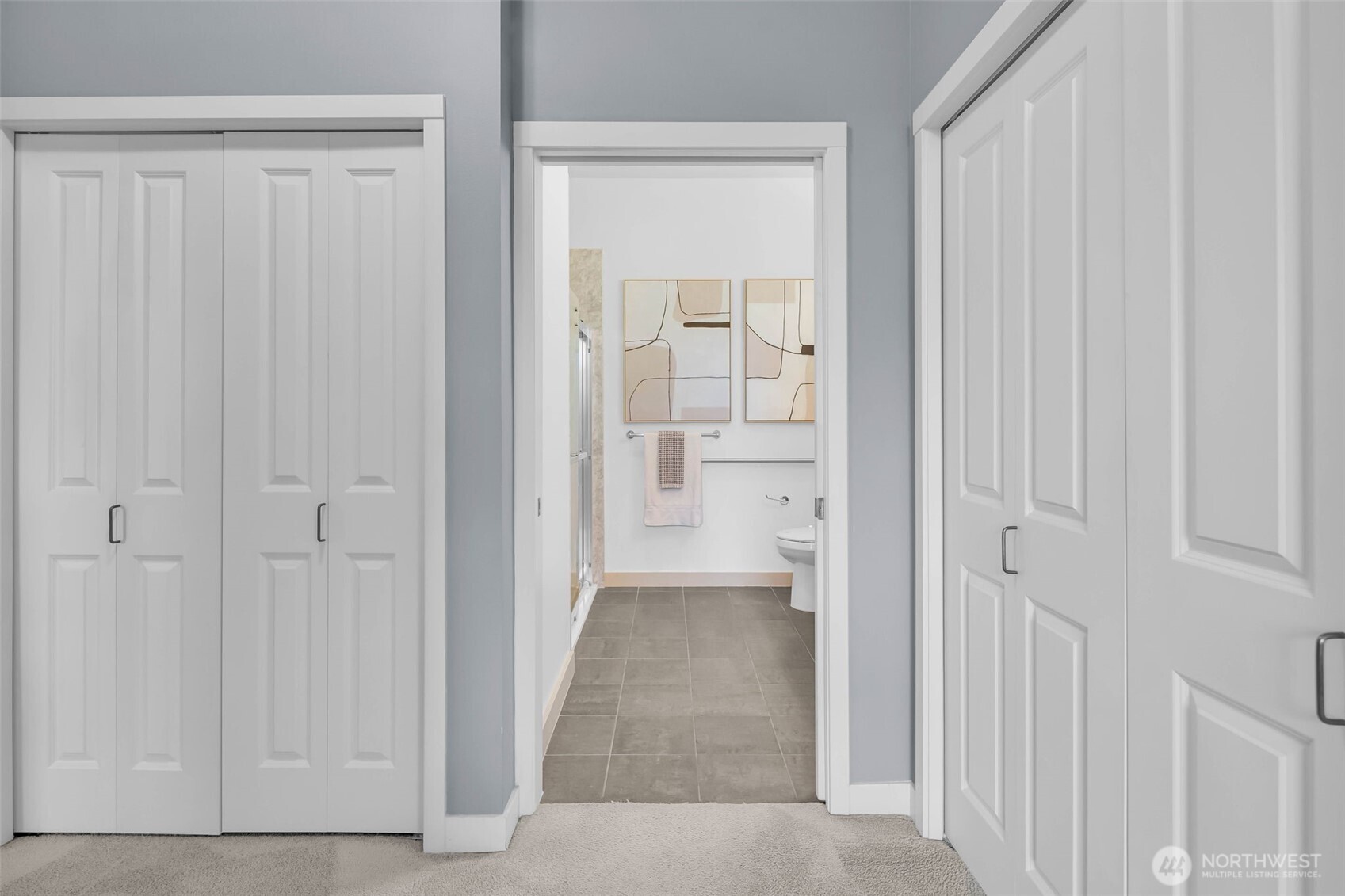 5001 California Avenue Southwest, Unit 103 Seattle, WA 98136 - Photo 18 of 40 a view of a hallway with wooden floor