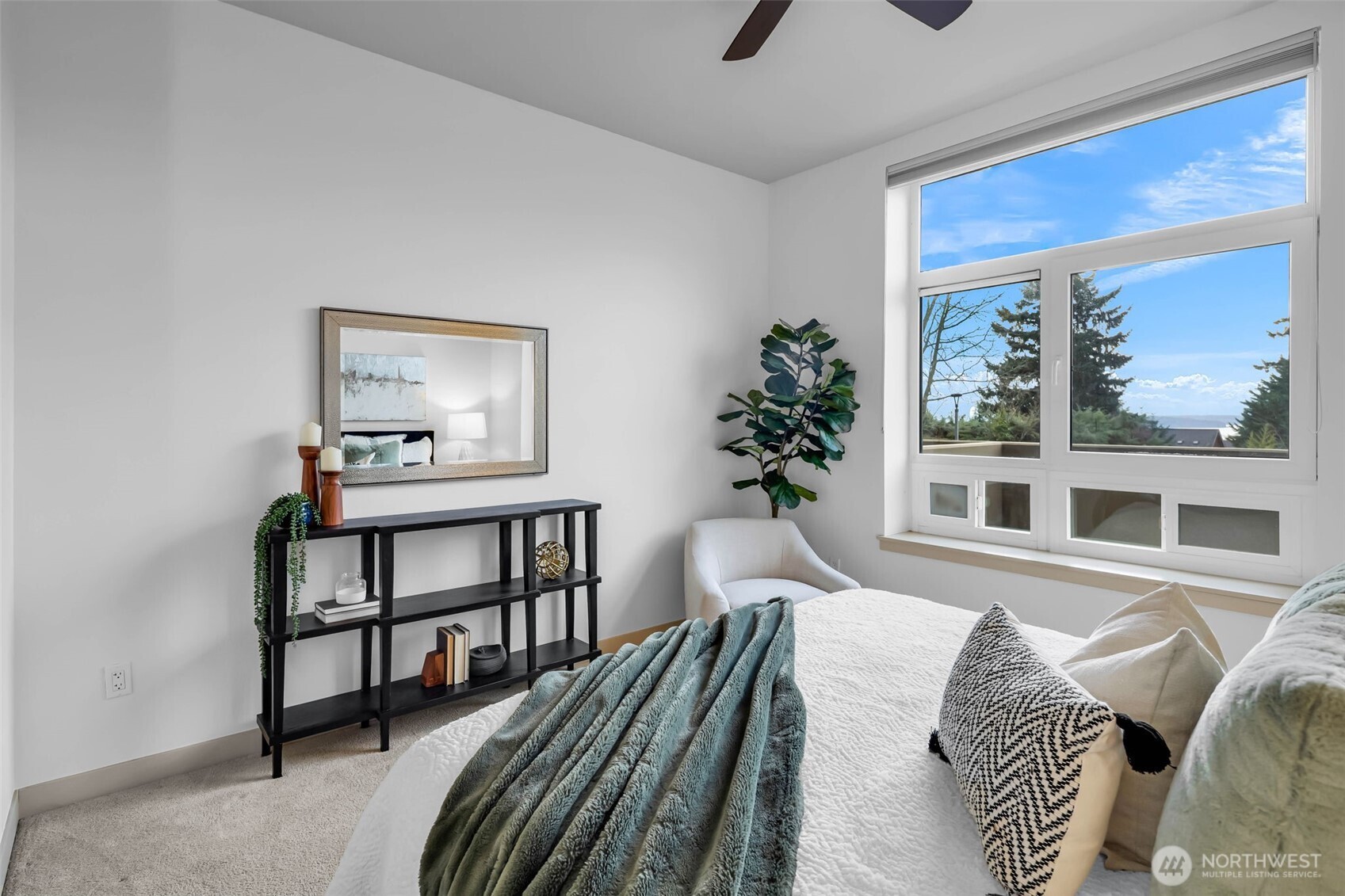 5001 California Avenue Southwest, Unit 103 Seattle, WA 98136 - Photo 20 of 40 a bedroom with furniture and a window