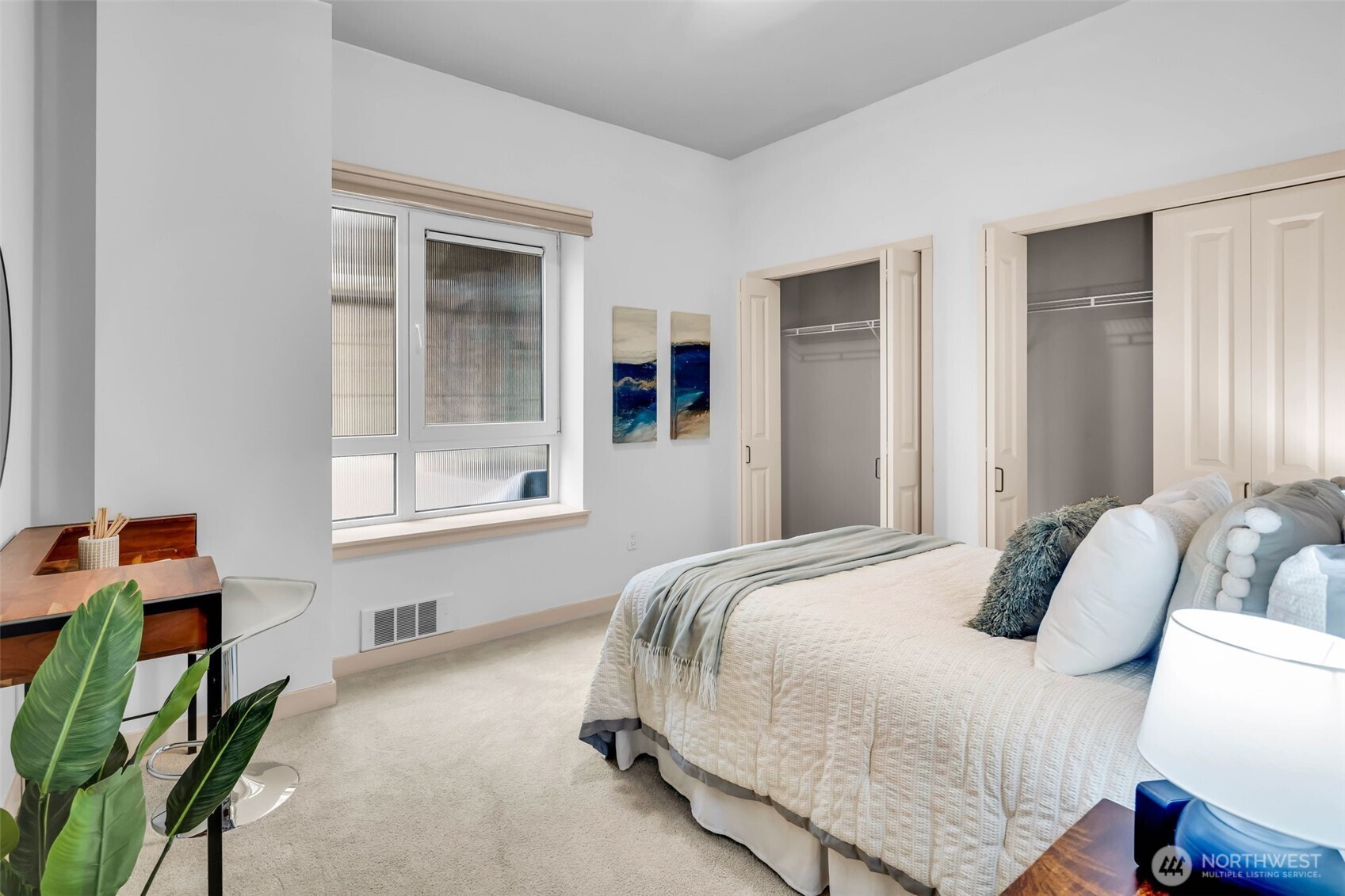 5001 California Avenue Southwest, Unit 103 Seattle, WA 98136 - Photo 25 of 40 a bedroom with bed and a window