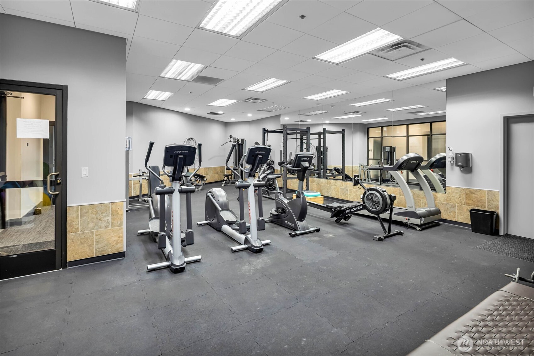 5001 California Avenue Southwest, Unit 103 Seattle, WA 98136 - Photo 34 of 40 a view of a room with gym equipment