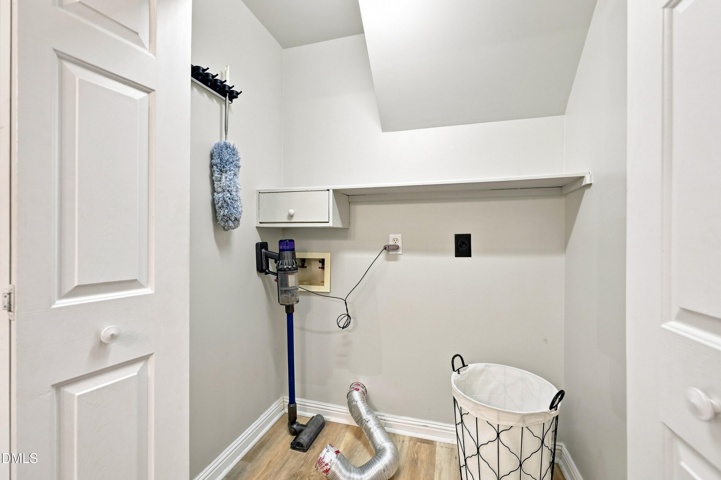 4307 Southwind Drive Raleigh, NC 27613 - Photo 18 of 35 Laundry Closet