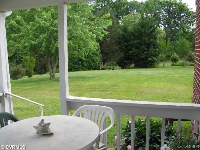 2034 Tuggle Road Farmville, VA 23901 - Photo 3 of 12 a view of a back yard from a balcony