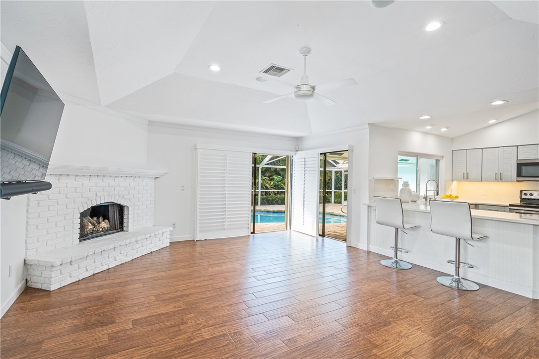 1939 Ocean Ridge Circle Vero Beach, FL 32963 - Photo 11 of 33 a view of an empty room with window and wooden floor