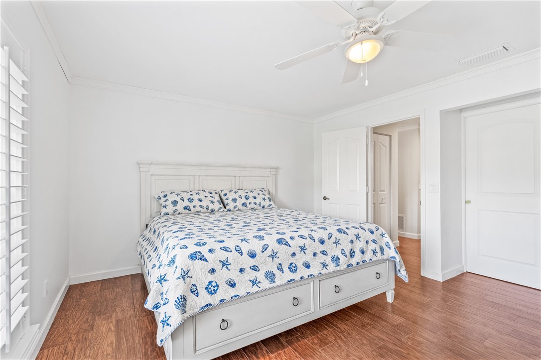 1939 Ocean Ridge Circle Vero Beach, FL 32963 - Photo 16 of 33 a bedroom with a bed and a window