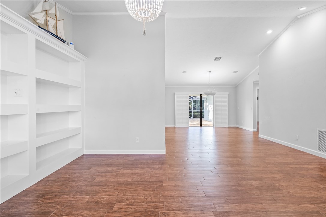1939 Ocean Ridge Circle Vero Beach, FL 32963 - Photo 21 of 33 a view of a livingroom with wooden floor