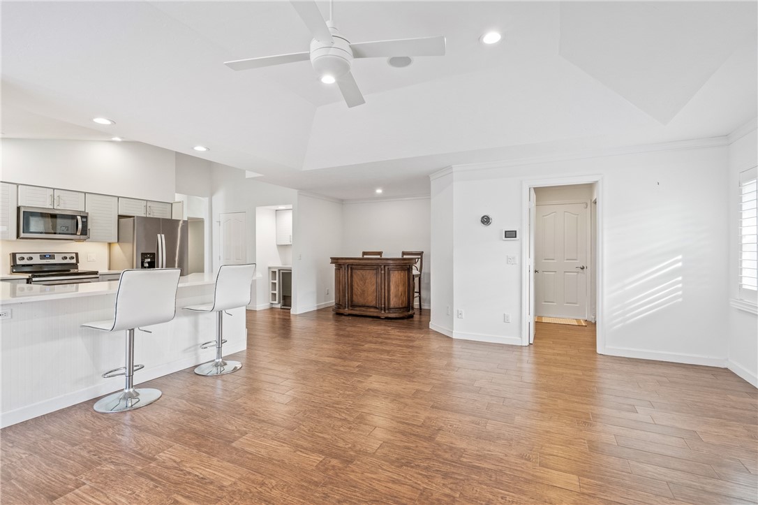 1939 Ocean Ridge Circle Vero Beach, FL 32963 - Photo 25 of 33 a view of kitchen with furniture and wooden floor