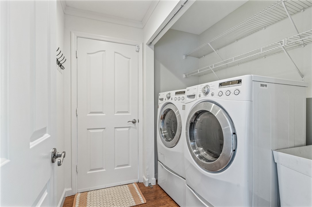 1939 Ocean Ridge Circle Vero Beach, FL 32963 - Photo 26 of 33 a view of a hallway with washer and dryer
